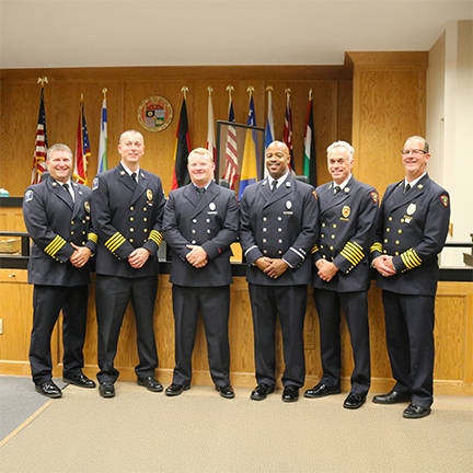 Fire Command Staff at Promotional Ceremony Fire Command Staff of varying ranks attend a promotional ceremony.